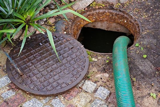 Pumping Septic Tanks from the Backyard — Atlanta, GA — Akins Plumbing