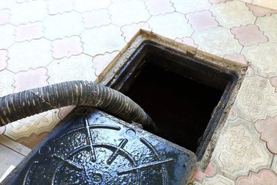 Machine Pumps Out Feces from Hole — Atlanta, GA — Akins Plumbing